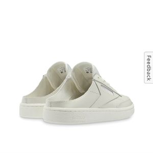 Size 9- Reebok Club C Slip On Sneaker Of White.